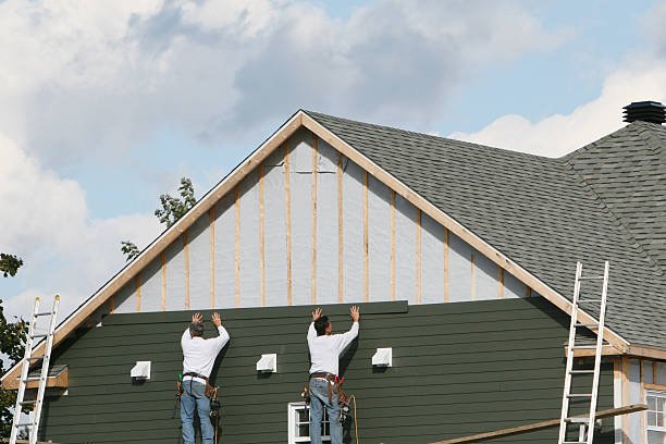 Professional Siding Contractor technician working in Burgess, VA